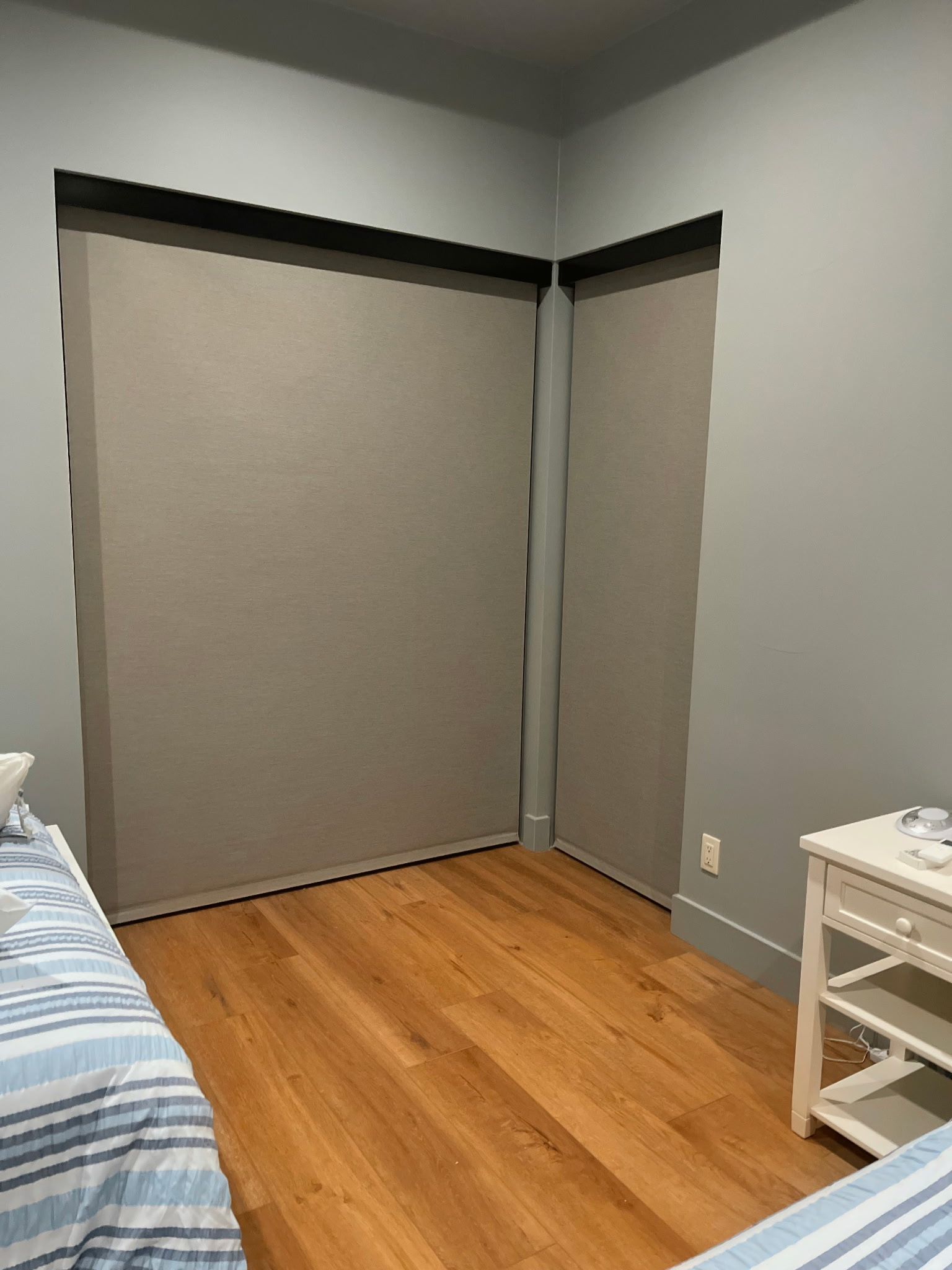 Blackout Roller Shades — Corner Bedroom — Beacon Blinds